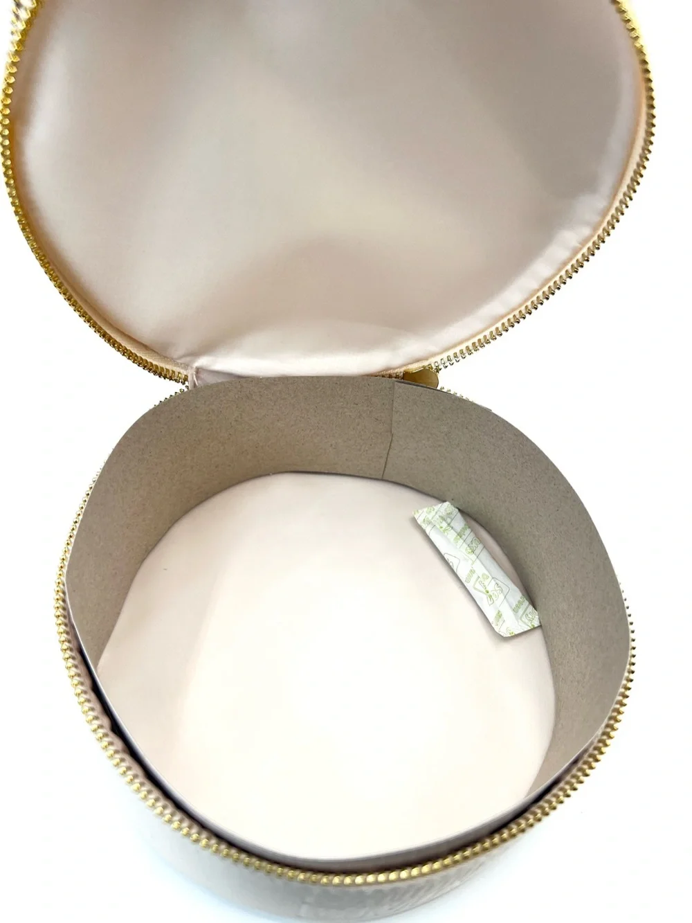 Gaultier Divine Vanity - Round Cosmetic Bag with Gold Accents in Cream
